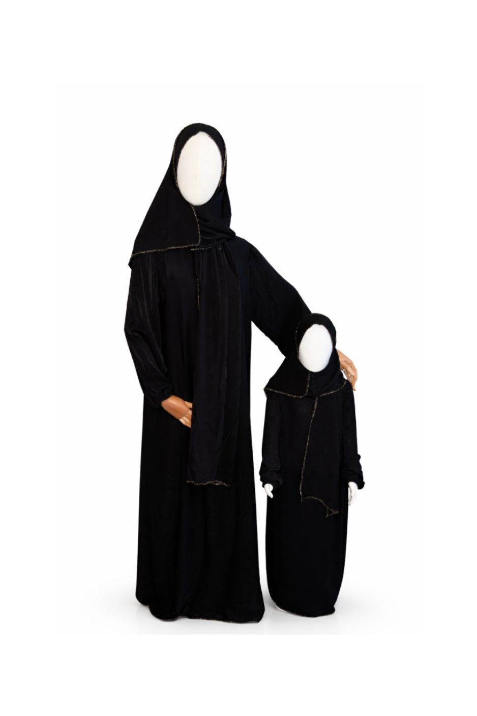 Black abaya with matching headscarf on a white background